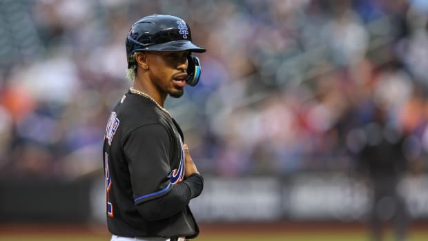 Francisco Lindor stands on base after a hit.